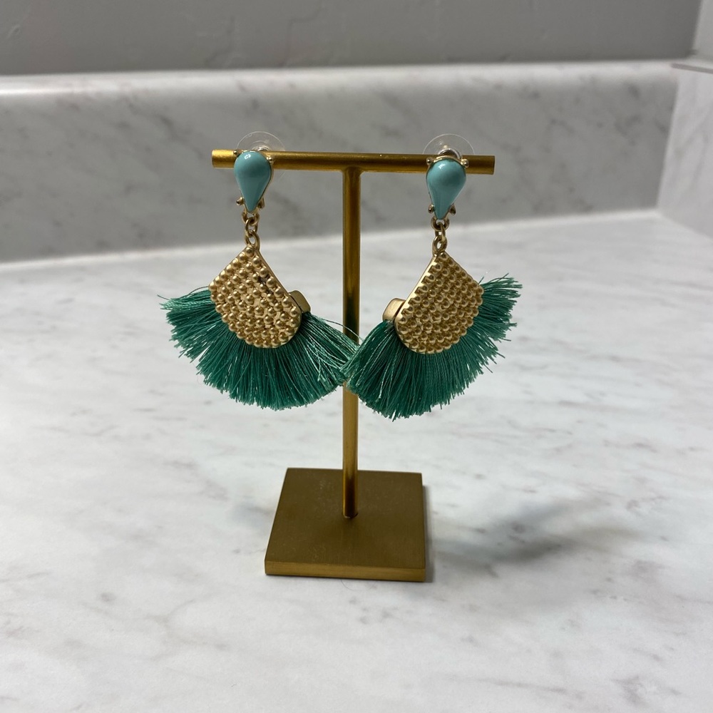 Teal tassel drop earrings.